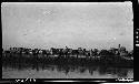 People gathered along a riverbank