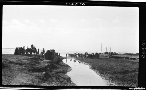 Traveling party crossing river