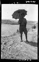 Man holding umbrella