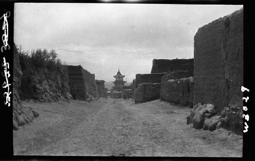 Walled road leading to building