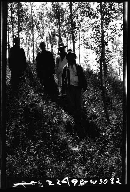 People standing on hillside