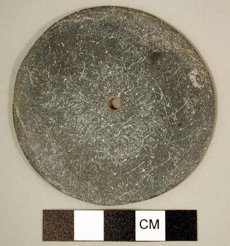 Spindle whorl, discoidal, polished, periphery ground flat, single perforation in