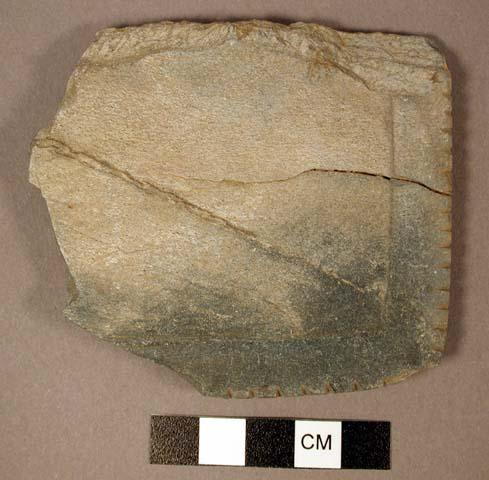 Rectangular palette corner fragment. raised border with series of small transver