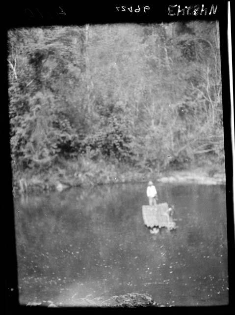 Person floating on raft