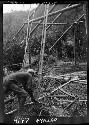 Worker constructs frame of building