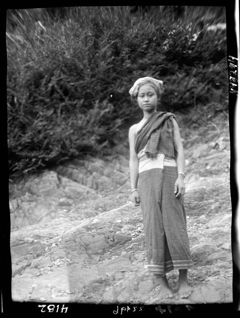 Girl stands on path