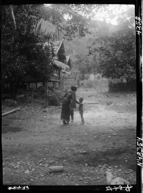 Adult and child on road