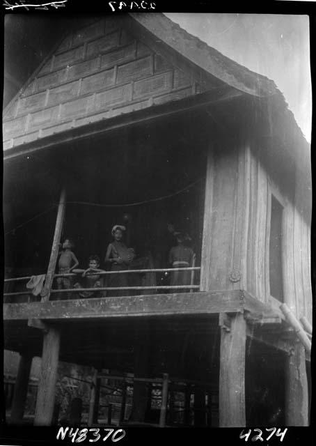 People stand in building