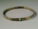 Silver hatband with turquoise stone in middle