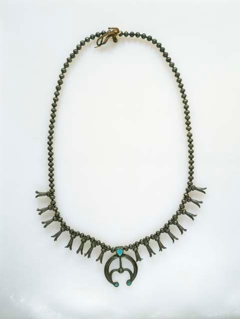 Squash blossom necklace.