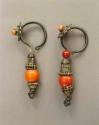 Pair of woman's silver earrings - set with corals - on the hoop of +