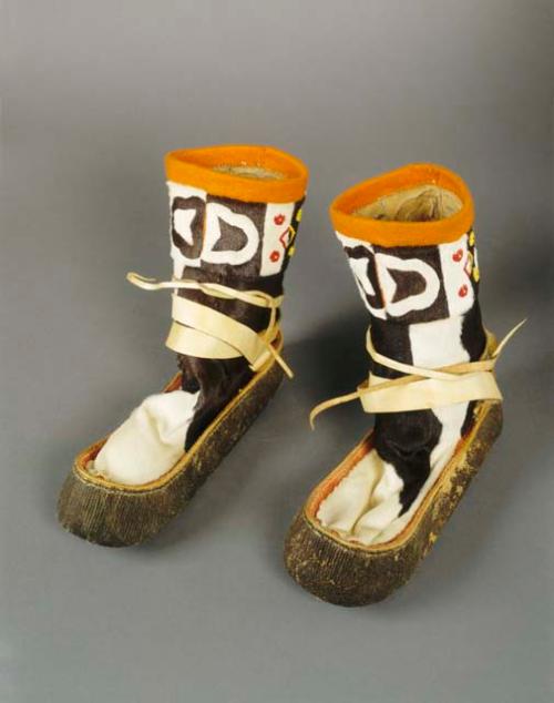 Pair of mukluks - fur and hide with bead and cloth trim