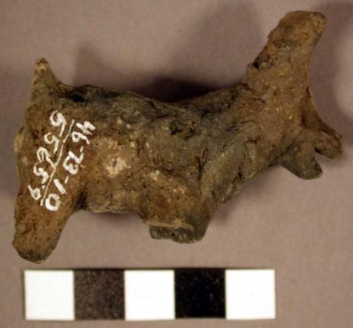 Zoomorphic figurine, 3 legs broken off; has tail, mouth, and ear features; one e