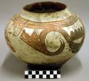 Part of a large polychrome pottery jar - black, white, red, yellow