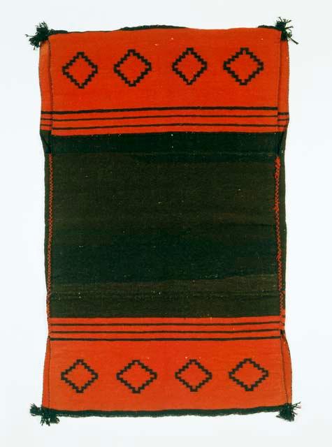 Woman's dress, wool: black central panel, red border panels top and bottom