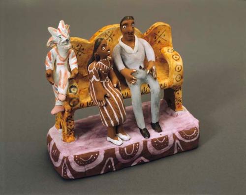 Ceramic polychrome courting figures with devil