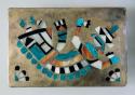 Belt buckle, a small rectangle inlaid with a katsina dancer made up of differen