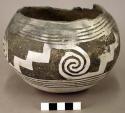 Ceramic jar, black on white exterior, round base, rim and neck missing