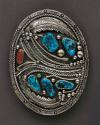 Belt buckle, oval silver buckle with a raised, stamped rim, 5 turquoise nuggets