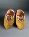 Pair of moccasins with silk work centers - red floral design