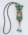 Bolo, silver katsina with 3 turquoise stones radiating from the head, stone on
