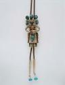 Bolo, silver katsina with inlaid coral and turquoise stones