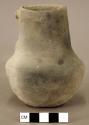 Ceramic pitcher, broken handle, sloping neck, plain