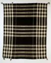 Black and white plaid wool manta (man's blanket)