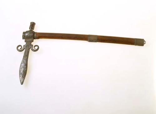 Pipe tomahawk, unknown culture. Spontoon type head w/ incised designs