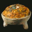 Tripod bowl with offering