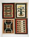 Four-in-one pictorial rug with yei, yeibichai, corn plant, storm pattern designs