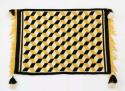 Optical illusion design rug, fringed at ends