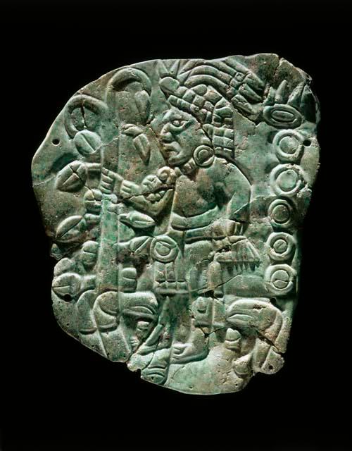 Greenstone tablet depicting lord grasping a cacao tree as a staff