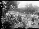 People gathered along river