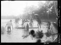 People gathered in shallow water