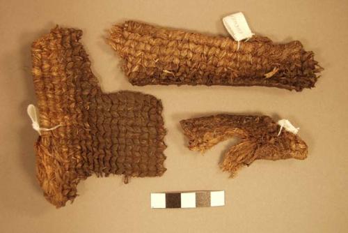 "Woven fragment, fiber (possible sandal)"