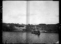 Boat travels on river