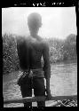 Man stands on boat