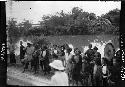 Group lined up along river