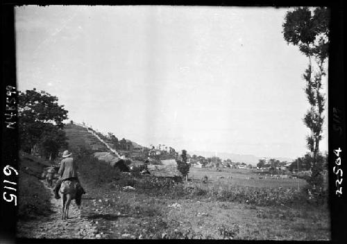 Landscape/person riding horse