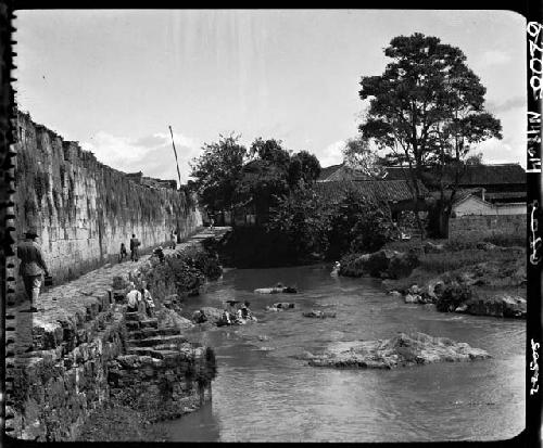 City wall and body of water