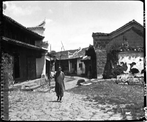 Person standing on village street