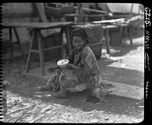 Woman sitting, eating