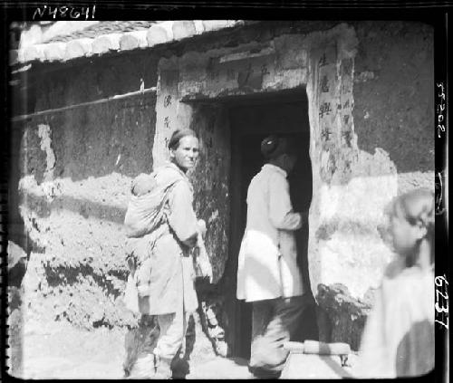 People walking through doorway