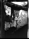 Children sitting on window ledge