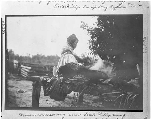 Woman winnowing corn/ Original Photo by Julian Dimmock