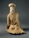 Jaina-style figurine in form of woman with small child or animal