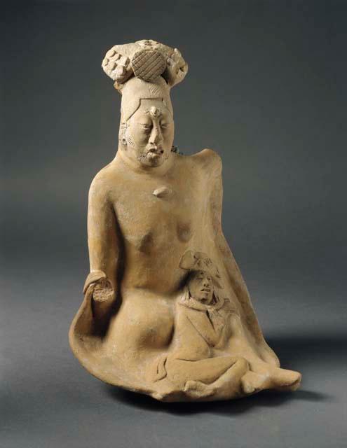 Jaina-style figurine in form of woman with small child or animal