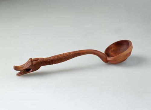 Ladle with crocodile form as handle