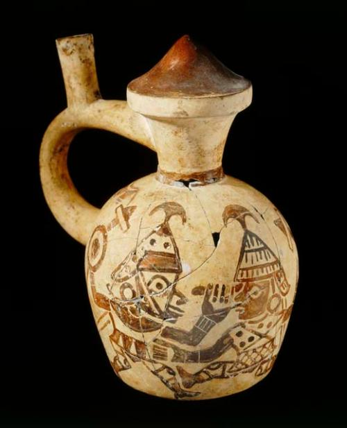 Ceramic bottle, stirrup spout, conical shaped covered spout, rounded body